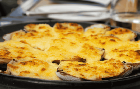 Machas a la Parmesana (Baked Razor Clams with Parmesan)